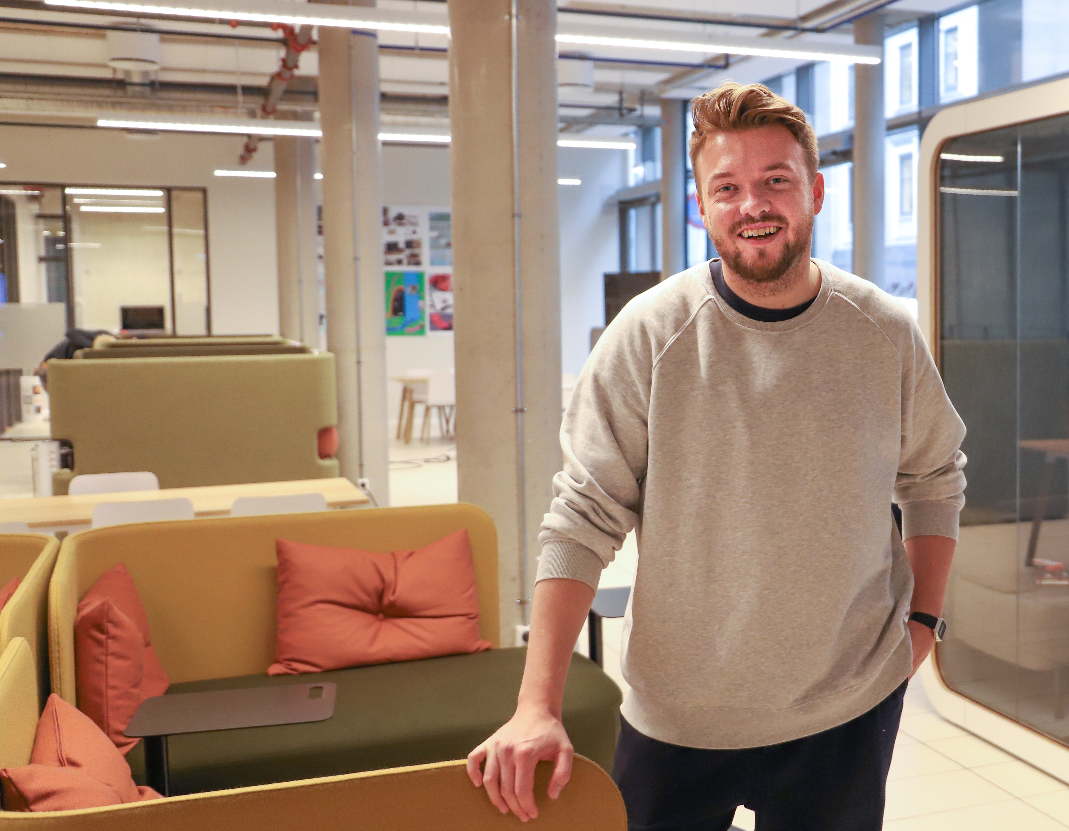 Producer, Songwriter, and member of Hajk and Death by Unga Bunga, Preben S. Andersen is standing in the reception area at Spikersuppa.