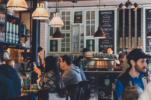 People in a busy coffee shop