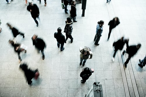 People moving around in the city.